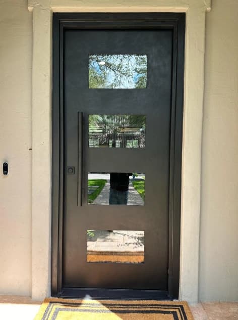 Elegant wrought iron door with decorative glass panel Austin